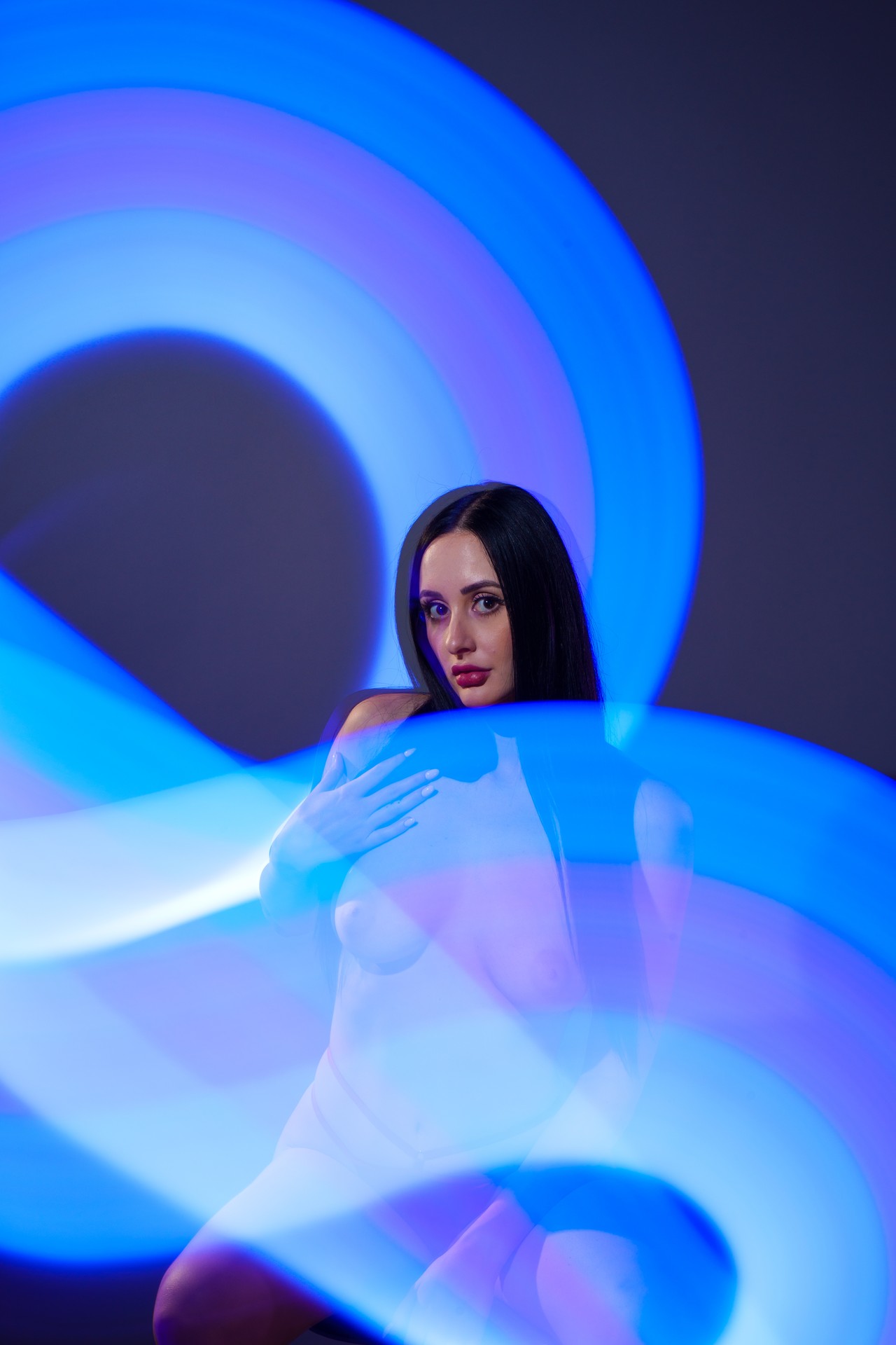 Violet Voss Topless blue light painting